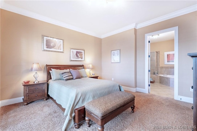 carpeted bedroom with ensuite bathroom and ornamental molding