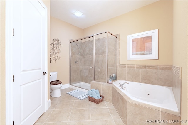 bathroom featuring toilet, independent shower and bath, and tile patterned floors