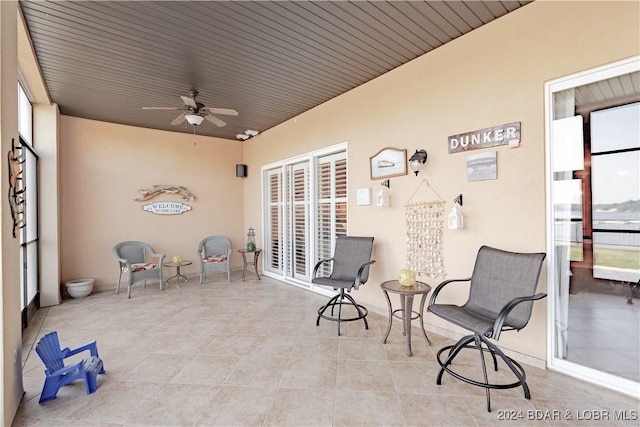 view of patio featuring ceiling fan