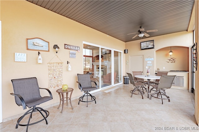 view of patio / terrace featuring ceiling fan