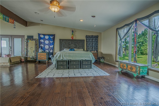 bedroom with french doors, ceiling fan, dark hardwood / wood-style flooring, and lofted ceiling