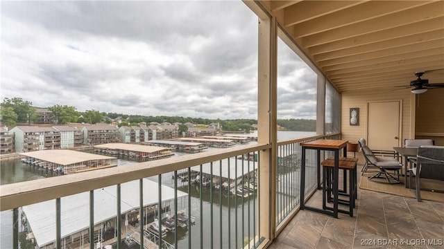 329 Bristol Bay Dr Unit 3B, Lake Ozark, MO 65049 - balcony featuring ceiling fan and a water view