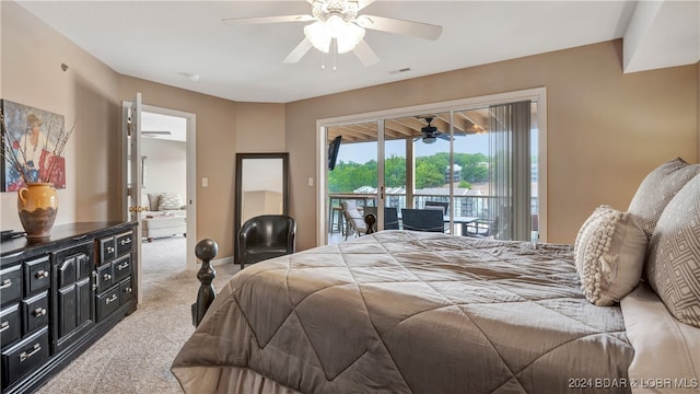 carpeted bedroom featuring access to exterior and ceiling fan