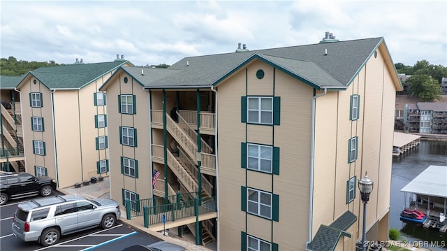 view of building exterior with a water view