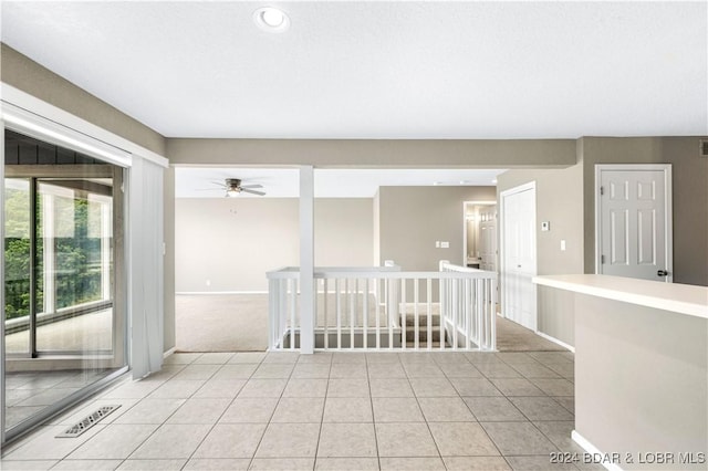 80 Regatta Bay Cir Unit 2B, Lake Ozark, MO 65049 - spare room featuring a ceiling fan, light tile patterned flooring, baseboards, and recessed lighting