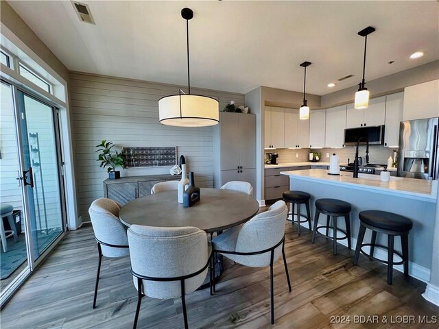 dining room featuring hardwood / wood-style flooring