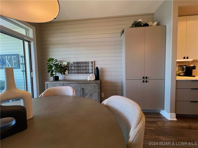 bedroom with hardwood / wood-style flooring and a closet