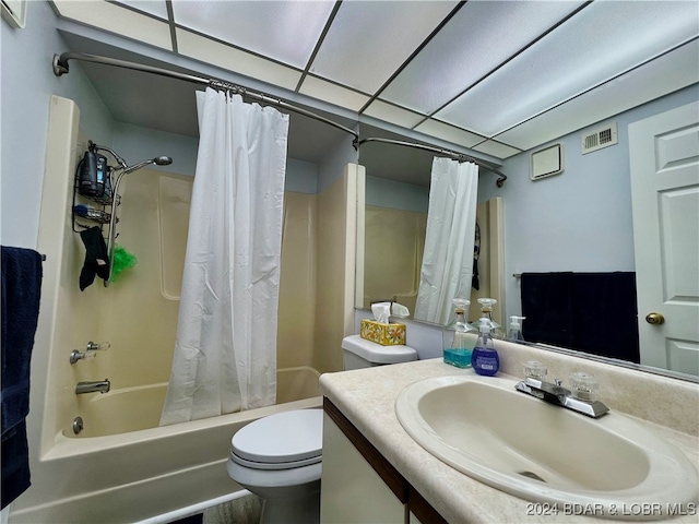 full bathroom featuring vanity, toilet, and shower / bath combo