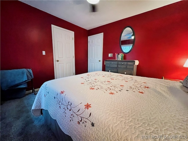 carpeted bedroom featuring ceiling fan