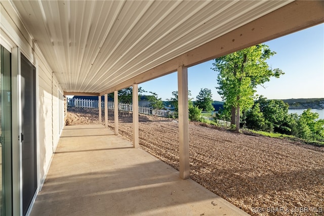 view of patio / terrace with a water view