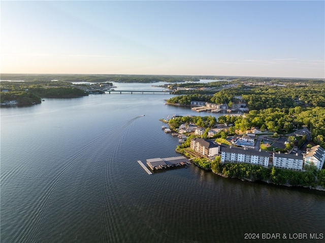 aerial view at dusk with a water view