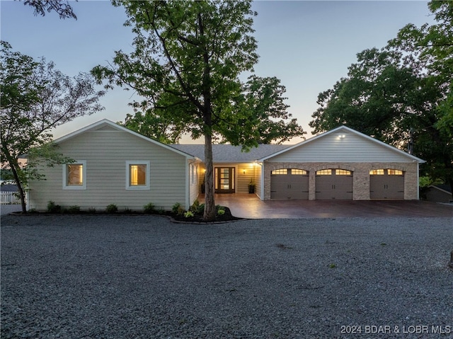 single story home featuring a garage