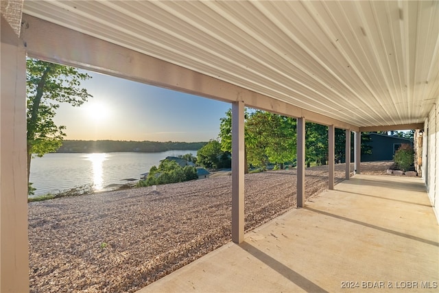 patio terrace at dusk with a water view