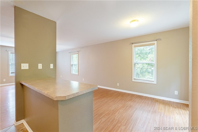 kitchen with light hardwood / wood-style flooring