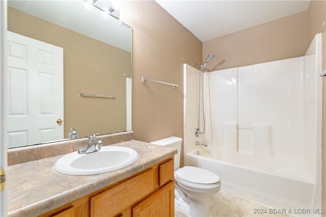 full bathroom with vanity, toilet, tile patterned floors, and bathtub / shower combination