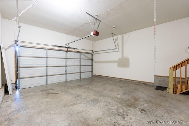 garage featuring a garage door opener