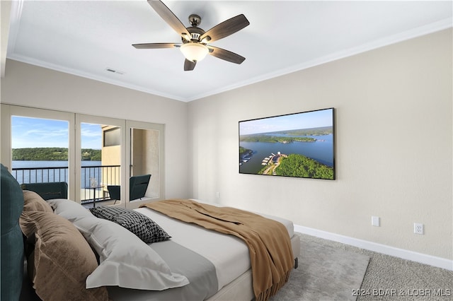 carpeted bedroom with ceiling fan, access to outside, and ornamental molding