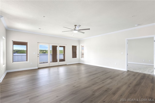 unfurnished room with ceiling fan, french doors, hardwood / wood-style floors, and ornamental molding