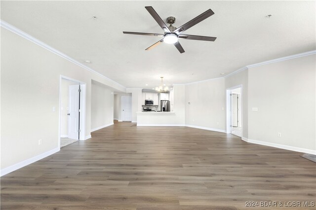 unfurnished living room with ornamental molding, ceiling fan with notable chandelier, and wood-type flooring