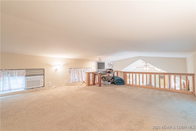 bonus room featuring carpet floors, ceiling fan, and vaulted ceiling