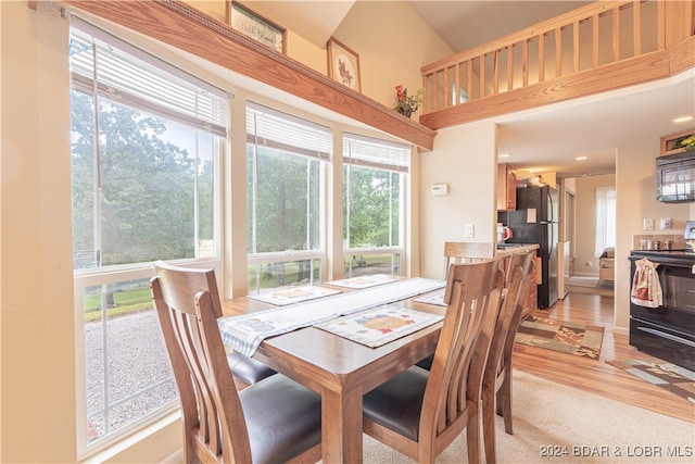 dining space featuring light hardwood / wood-style flooring