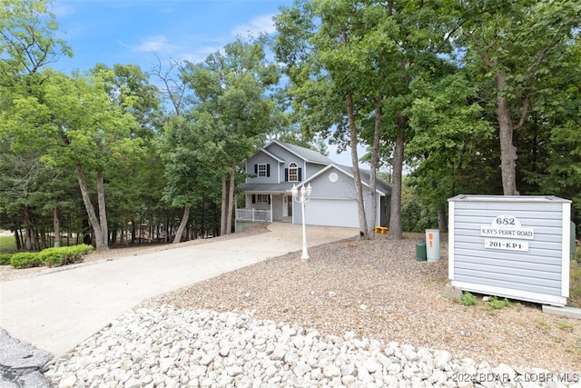 front of property with a garage