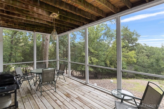 sunroom with wood ceiling