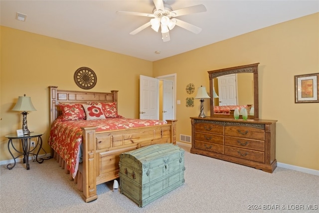 bedroom featuring ceiling fan and carpet floors