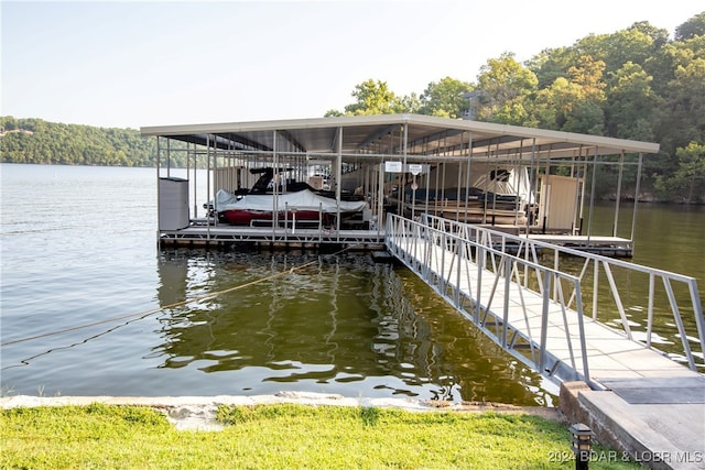 dock area featuring a water view