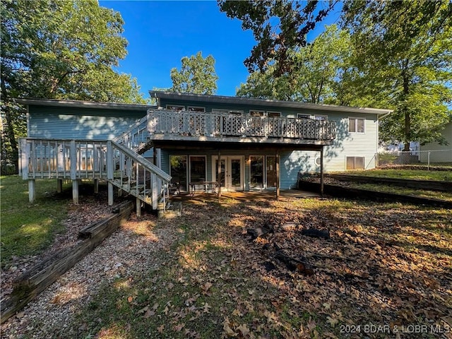 rear view of house with a deck