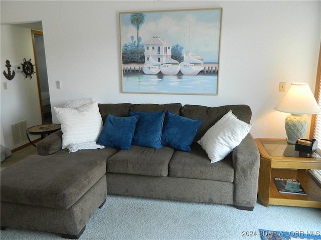 living room featuring carpet flooring and visible vents