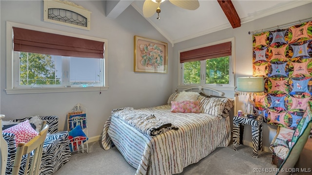 bedroom featuring carpet, vaulted ceiling with beams, multiple windows, and ceiling fan