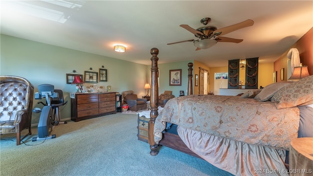 bedroom featuring ceiling fan and light colored carpet