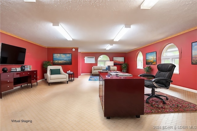 office featuring ornamental molding, a textured ceiling, baseboards, and a wall mounted AC