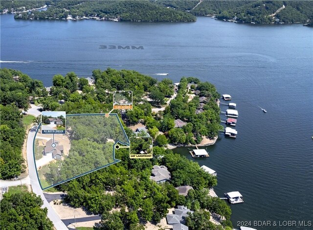 drone / aerial view featuring a water view