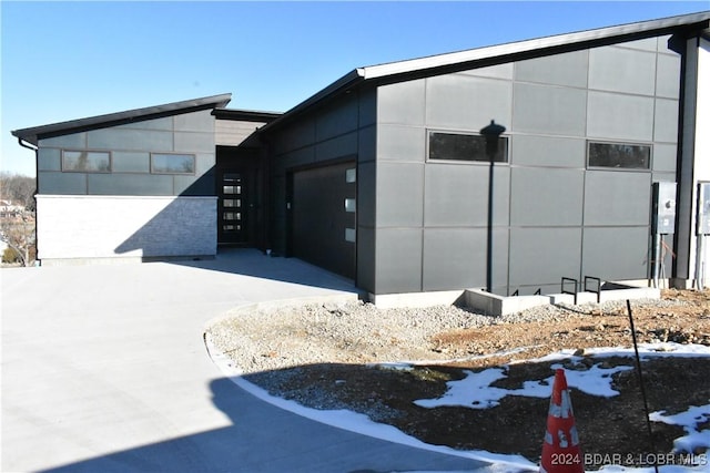 view of front of property with a garage