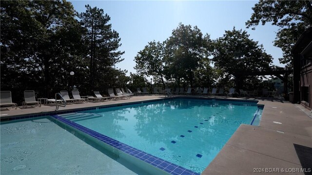 view of pool with a patio