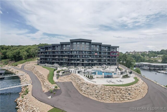 view of building exterior with a water view