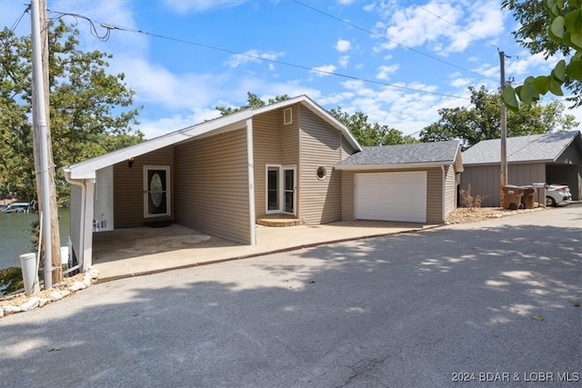 view of front of property with a garage