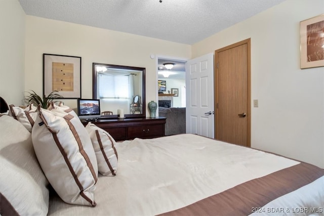 bedroom featuring a textured ceiling