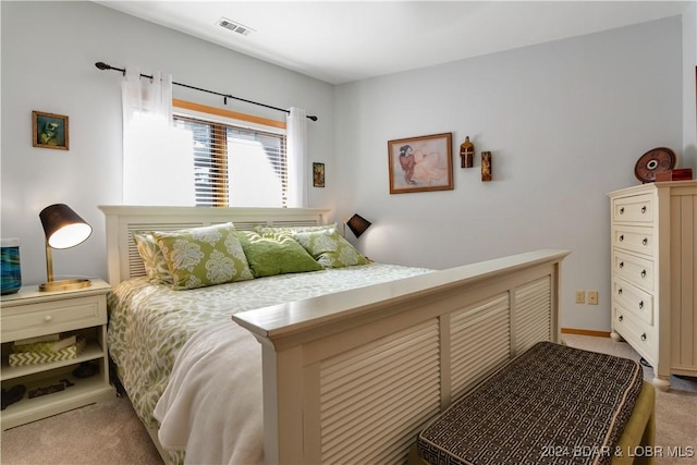 bedroom featuring carpet and visible vents