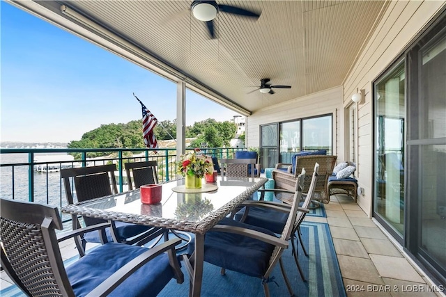 exterior space with a ceiling fan and outdoor dining space