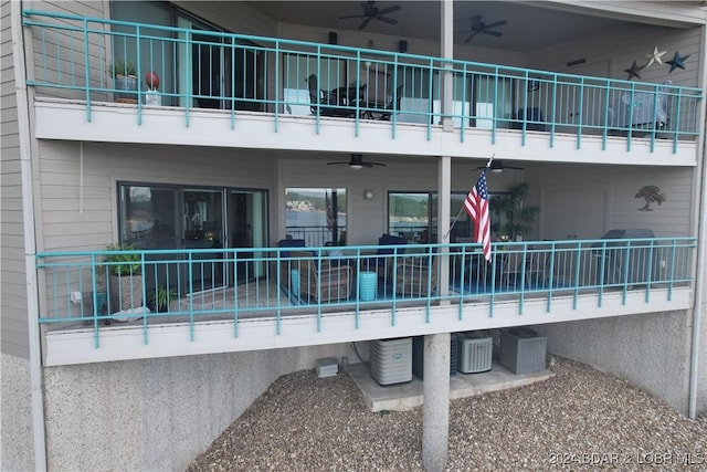 exterior space with a ceiling fan and central air condition unit