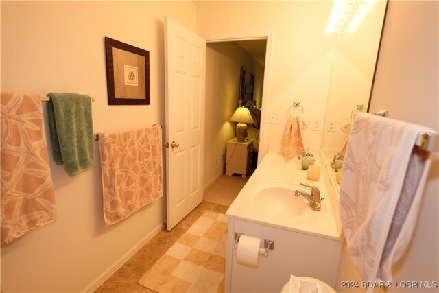 bathroom featuring tile patterned floors and vanity