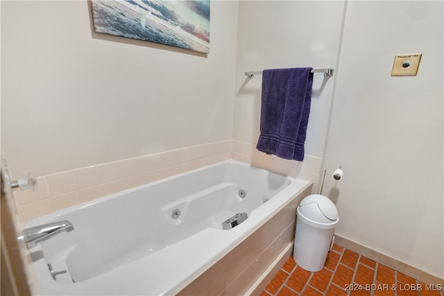 bathroom featuring tile patterned flooring and a bathtub