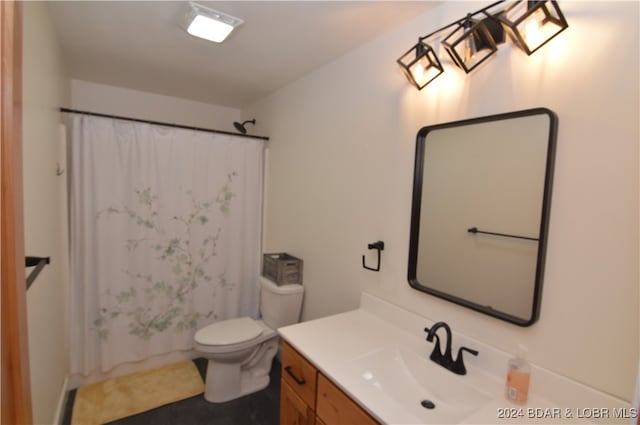 full bathroom with shower / tub combo, vanity, and toilet