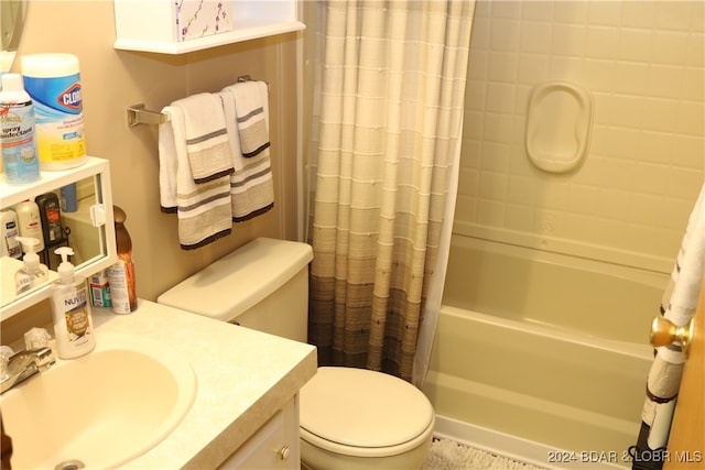 full bathroom featuring tile patterned flooring, vanity, shower / bath combo, and toilet