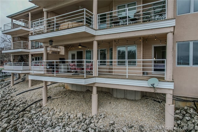 rear view of house featuring a balcony