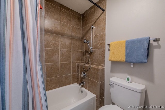 bathroom with toilet and shower / bath combination with curtain