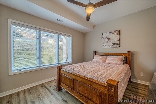 bedroom featuring ceiling fan and wood-type flooring